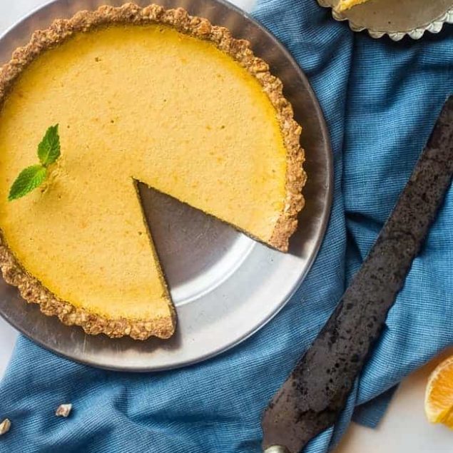 Gluten Free Orange Pie with Almond Crust - This easy, healthy orange pie uses a secret ingredient to make it PACKED with protein and low in calories! It's perfect for breakfast, snack or dessert! | Foodfaithfitness.com | @FoodFaithFit