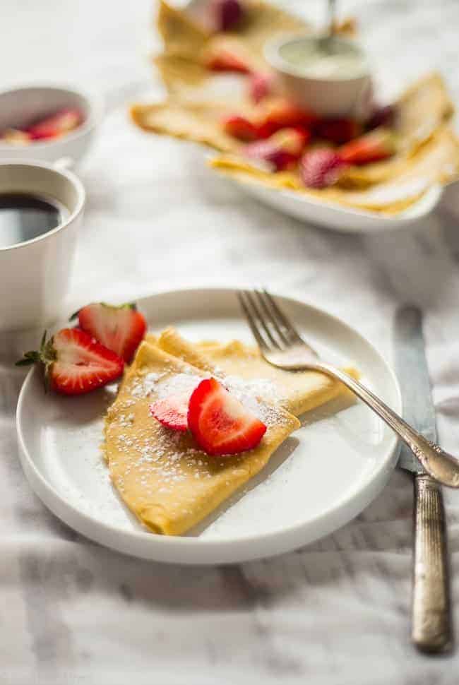 Paleo Crepes - These gluten free, paleo crepes are SO easy to make. Stuff them with your favorite fillings for a healthy breakfast or brunch that's only 75 calories and 3 SmartPoints! | Foodfaithfitness.com | @FoodFaithFit