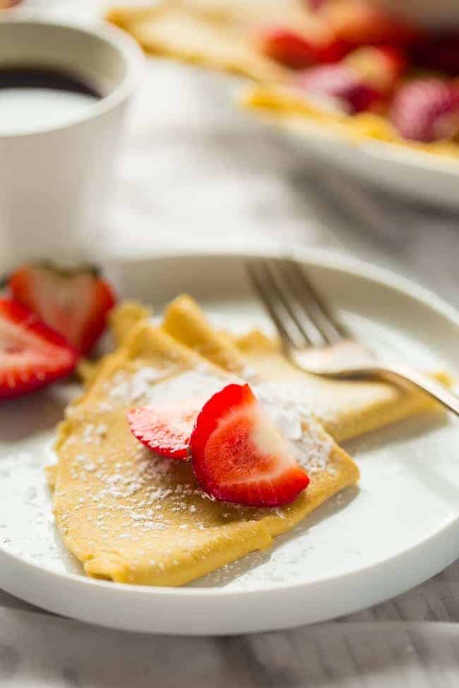 Paleo Crepes - These gluten free, paleo crepes are SO easy to make. Stuff them with your favorite fillings for a healthy breakfast or brunch that's only 75 calories and 3 SmartPoints! | Foodfaithfitness.com | @FoodFaithFit