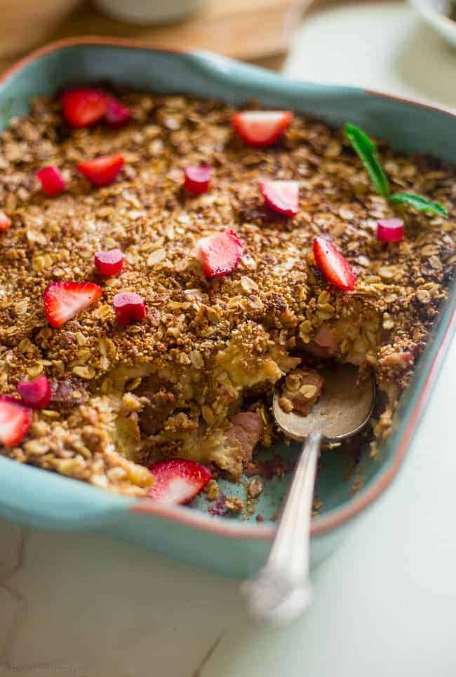 Gluten Free Strawberry Rhubarb French Toast Bake - This easy french toast bake is bursting with sweet strawberries and tangy rhubarb. It's a perfect, make-ahead spring breakfast or brunch! | Foodfaithfitness.com | @FoodFaithFit