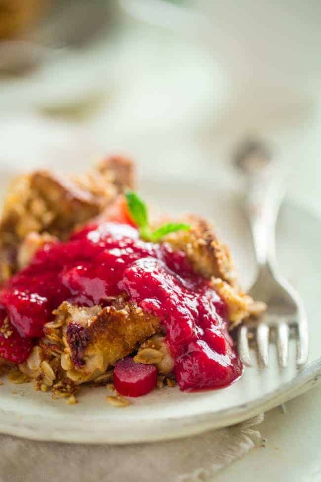 Gluten Free Strawberry Rhubarb French Toast Bake - This easy french toast bake is bursting with sweet strawberries and tangy rhubarb. It's a perfect, make-ahead spring breakfast or brunch! | Foodfaithfitness.com | @FoodFaithFit