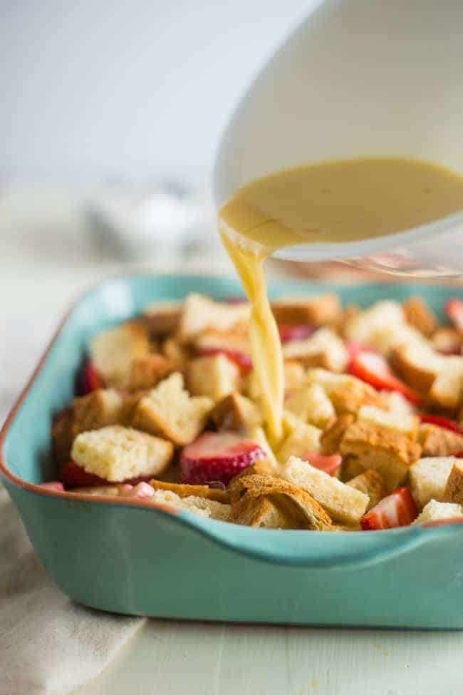 Gluten Free Strawberry Rhubarb French Toast Bake - This easy french toast bake is bursting with sweet strawberries and tangy rhubarb. It's a perfect, make-ahead spring breakfast or brunch! | Foodfaithfitness.com | @FoodFaithFit