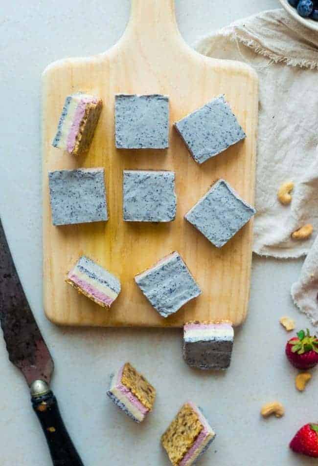 Vegan No Bake Red, White and Blueberry Cashew Cream Bars - These healthy bars are made of berry cashew cream, layered and then frozen! They're an easy, paleo and vegan friendly dessert for the fourth of July! | Foodfaithfitness.com | @FoodFaithFit