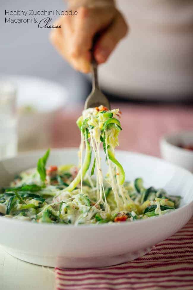 Zucchini Noodle Mac and Cheese - This easy gluten free mac and cheese uses zucchini noodles and Greek yogurt to keep it healthy, low carb and protein packed! It's comfort food for only 250 calories and 5 SmartPoints! | Foodfaithfitness.com | @FoodFaithFit