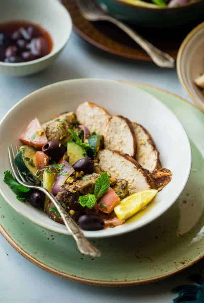 Paleo Grilled Moroccan Chicken Bowls - These grilled Moroccan chicken bowls are loaded with charred veggies, creamy tahini and spicy chicken! They're a quick and easy dinner that's paleo friendly and Whole30 compliant! | Foodfaithfitness.com | @FoodFaithFit