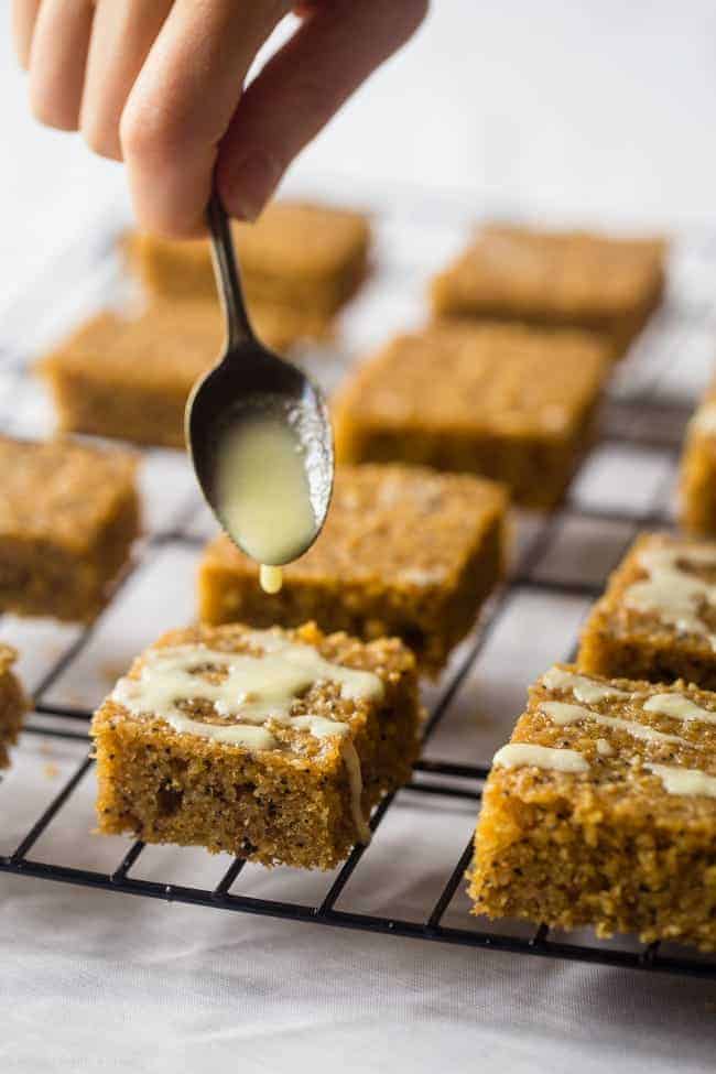 Gluten Free Slower Cooker Lemon Poppy Seed Cake Bars - These easy, low carb cake bars are made in the slow cooker! They're soft, chewy and secretly healthy, gluten/grain free and packed with protein! | Foodfaithfitness.com | @FoodFaithFit