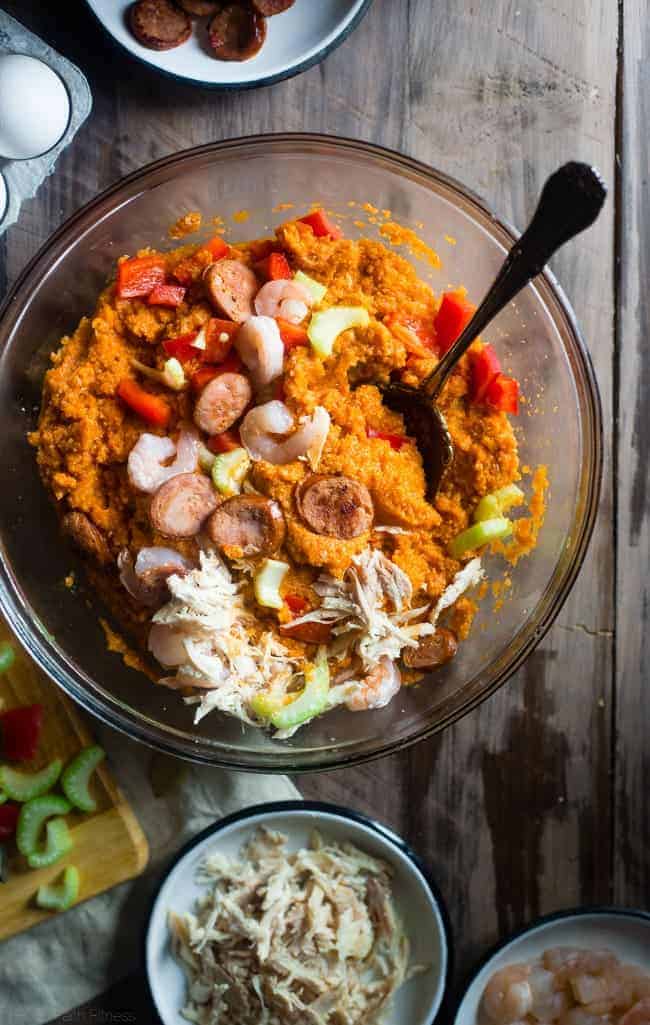 Paleo Cajun Cauliflower Casserole - This Cajun cauliflower casserole tastes like a bowl of Jambalaya but is secretly loaded with hidden veggies and protein! It's a gluten free, paleo-friendly meal that the whole family will love! | Foodfaithfitness.com | @FoodFaithFit