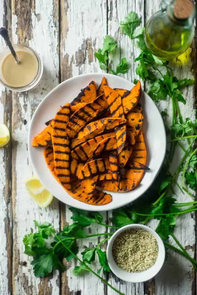 Vegan Grilled Sweet Potato and Mint Tahini Cauliflower Rice Wraps - Grilled sweet potatoes, mint tahini cauliflower rice and spiralized cucumber noodles make this easy, healthy and portable meatless meal! | Foodfaithfitness.com | @FoodFaithFit