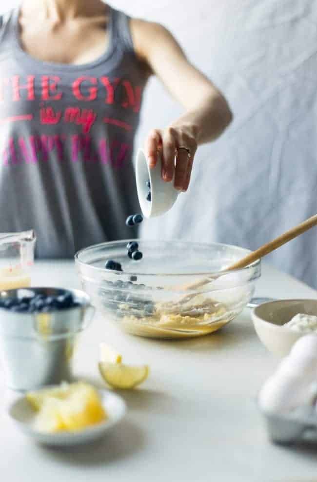 Single-Serve Lemon Blueberry Paleo Protein Waffles - These single-serve protein waffles are studded with juicy blueberries and have a 5 minute lemon sauce! Perfect for a paleo friendly, gluten free breakfast on busy mornings! | FoodFaithfitness.com | @FoodFaithFit