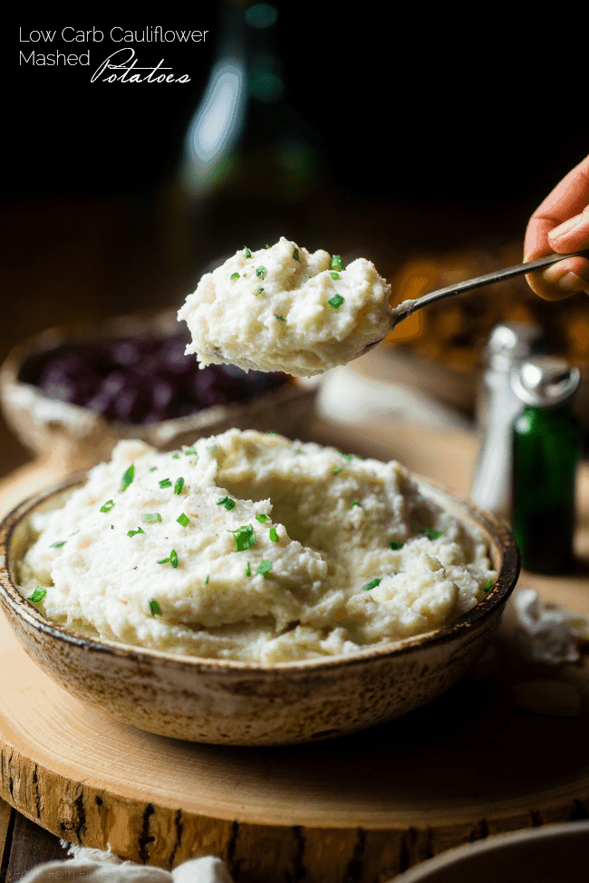 5 Ingredient Cauliflower Mashed Potatoes - These quick and easy, low carb cauliflower mashed potatoes only have 5 ingredients, 62 calories, 1 SmartPoint and use a secret ingredient to pack them with protein! Perfect for a healthy Thanksgiving! | Foodfaithfitness.com | @FoodFaithFit