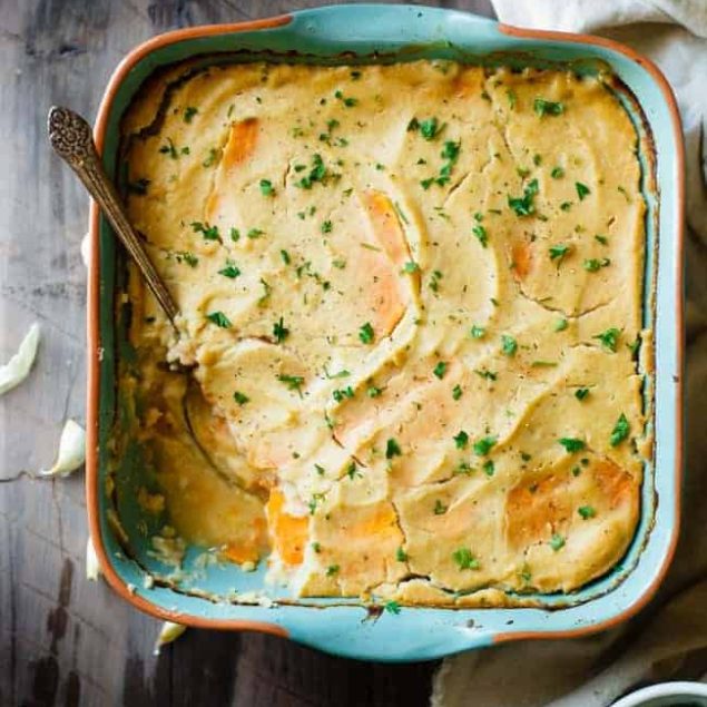 Cauliflower Alfredo Vegan Scalloped Sweet Potatoes - This whole30 compliant side dish is so creamy you'll never know they're under 200 calories, paleo friendly and have hidden veggies! Perfect for Thanksgiving! | Foodfaithfitness.com | @FoodFaithFit