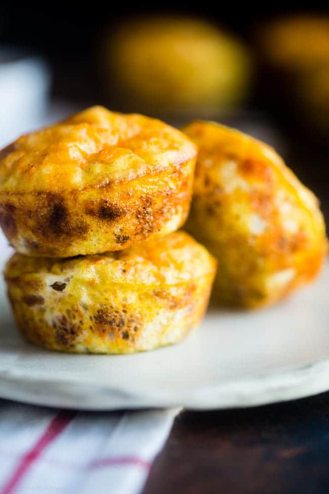 6 Ingredient Taco Egg Muffins - These 6-ingredient, kid-friendly taco breakfast egg muffins have all the Mexican taste without the carbs! They're an easy, healthy, gluten free and protein packed portable breakfast with only 105 calories! | Foodfaithfitness.com| @FoodFaithFit