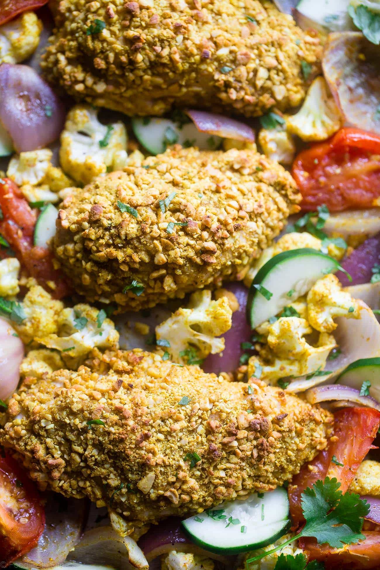 Easy Healthy Cashew Chicken Sheet Pan Dinner - This low carb cashew chicken is flavored with curry, and the whole meal is made on one sheet! It's an easy, healthy weeknight meal the whole will love, for under 400 calories! | Foodfaithfitness.com | @FoodFaithFit