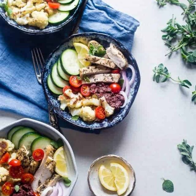 Greek Chicken Meal Prep Bowls - These low carb chicken bowls have roasted cauliflower and an olive tapenade. They're an easy, whole30 compliant, paleo meal that you can prep ahead, and their only 300 calories! | Foodfaithfitness.com | @FoodFaithFit