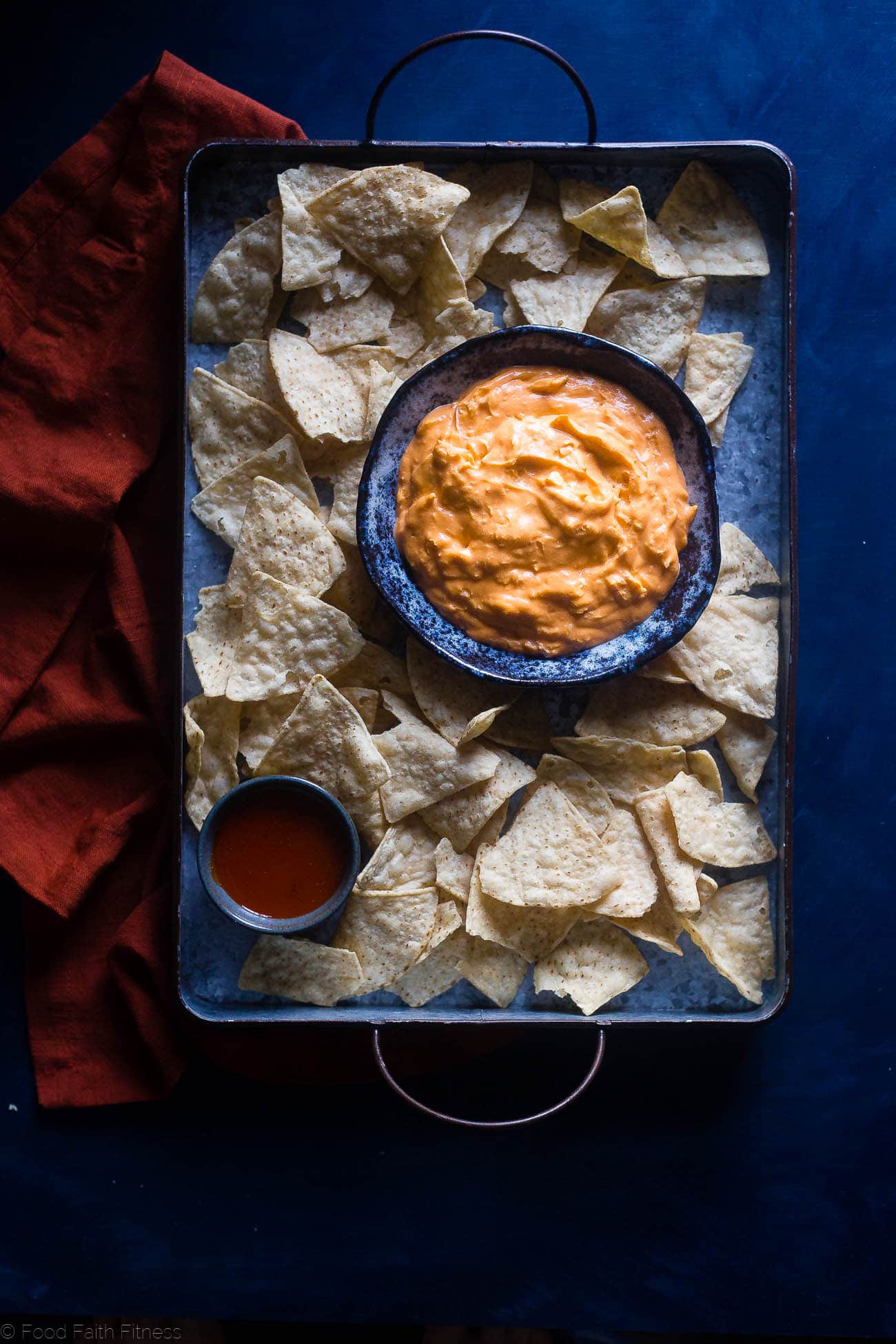 5 Ingredient Crockpot Healthy Buffalo Chicken Dip with Cauliflower - This crock pot buffalo chicken dip is made with cauliflower so it's packed with hidden veggies and extra creamy! It's a healthy, low carb and gluten free appetizer for game day! | Foodfaithfitness.com | @FoodFaithFit