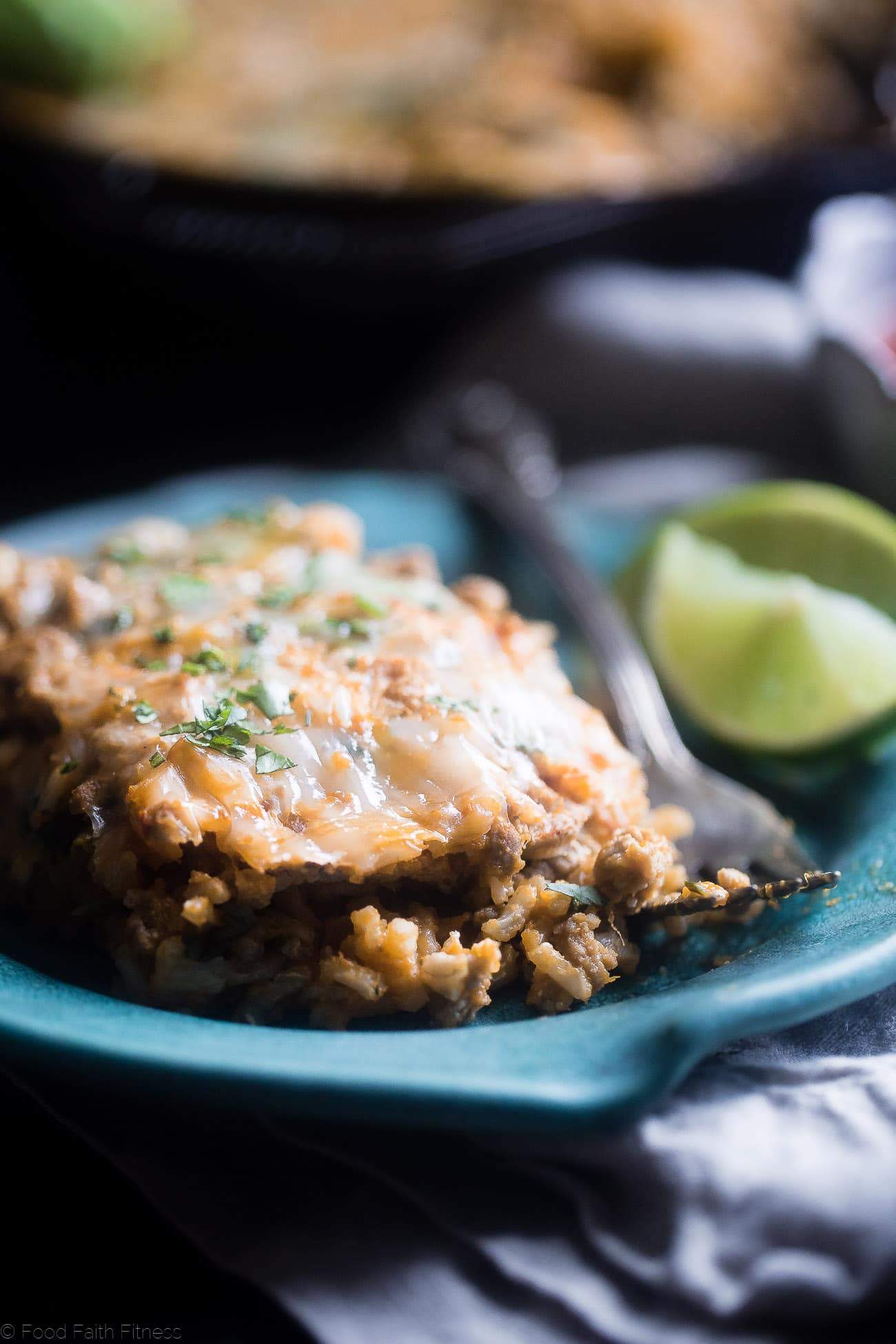 One Pot Mexican Chicken Rice Casserole - This chicken Mexican rice casserole uses sweet potato for extra creaminess! It's a healthy, gluten free, 8 ingredient dinner for busy weeknights that is only 330 calories! | Foodfaithfitness.com | @FoodFaithFit