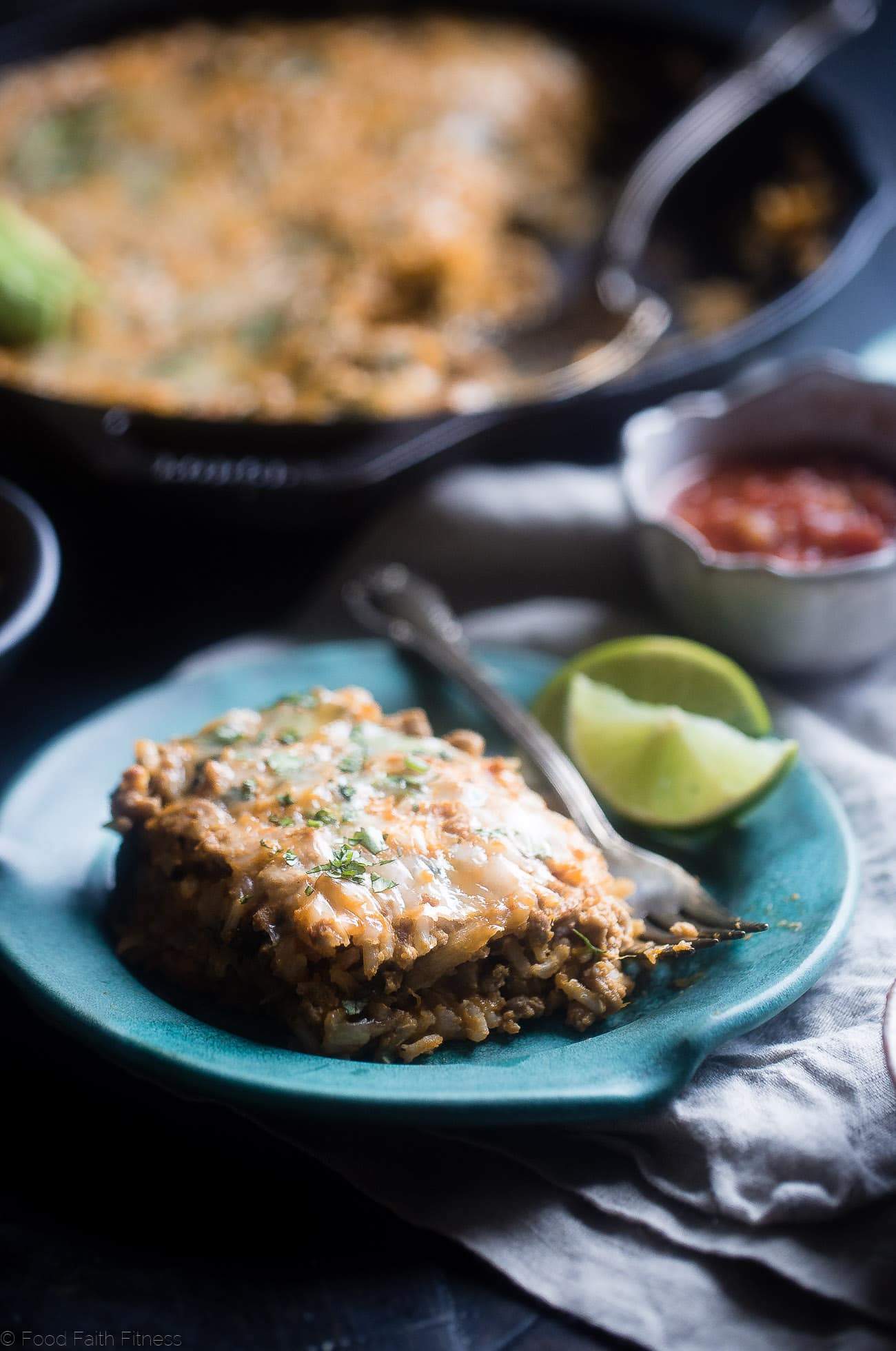 One Pot Mexican Chicken Rice Casserole - This chicken Mexican rice casserole uses sweet potato for extra creaminess! It's a healthy, quick and easy, 8 ingredient dinner for busy weeknights that is only 330 calories! | Foodfaithfitness.com | @FoodFaithFit