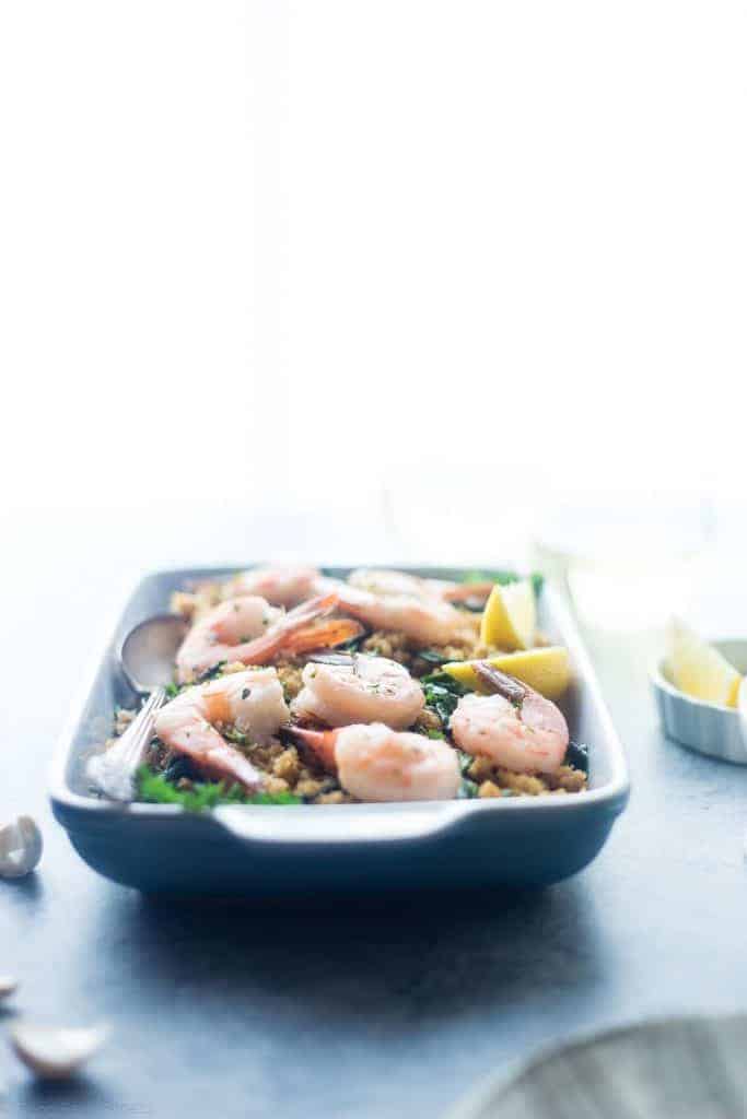 Slow Cooker Garlic Butter Shrimp and Quinoa - This easy, 7 ingredient weeknight dinner is made in the slow cooker! It's a healthy, gluten and whole grain meal that the whole family will love! | Foodfaithfitness.com | @FoodFaithFit