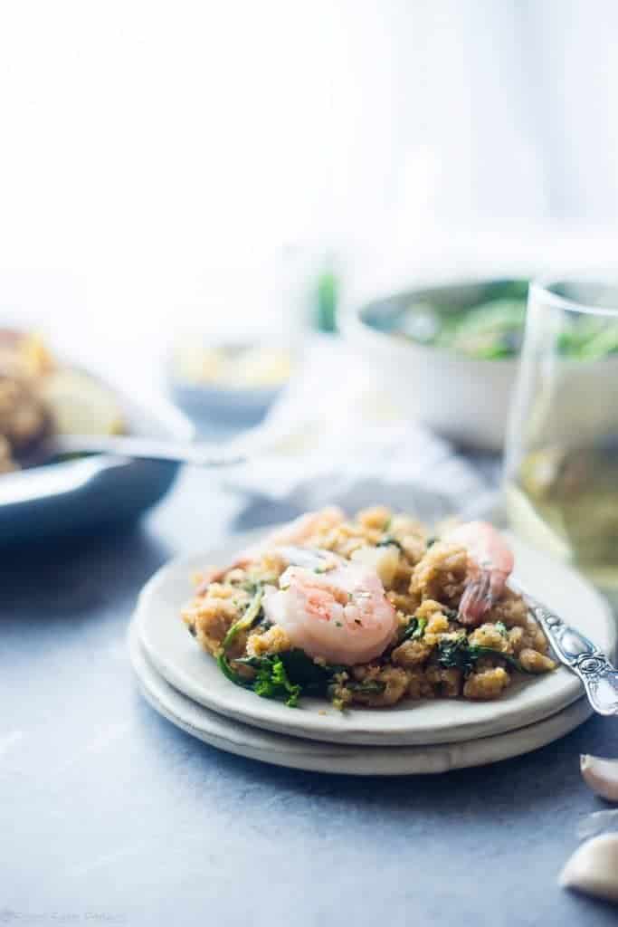 Slow Cooker Garlic Butter Shrimp and Quinoa - This quick and easy weeknight dinner is 7 ingredients and made in the slow cooker! It's a healthy, gluten and lactose free meal that the whole family will love! | Foodfaithfitness.com | @FoodFaithFit