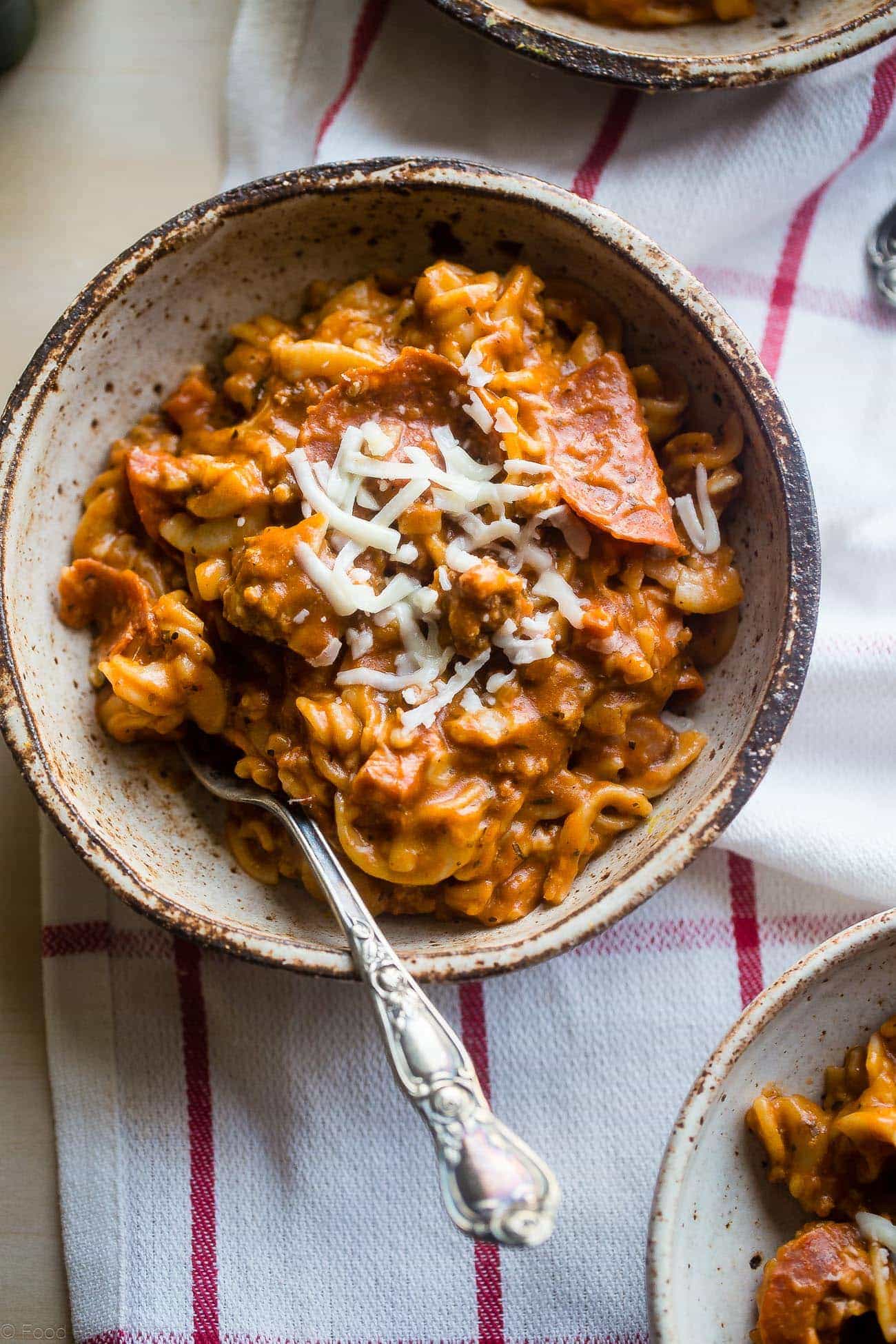 Gluten Free Crock Pot Pizza Pasta - This easy gluten free crock pot pasta has all the flavors of meat lovers pizza, but without all the work! It's a healthy, crowd pleasing weeknight dinner that the whole family will love! | Foodfaithfitness.com | @FoodFaithFit