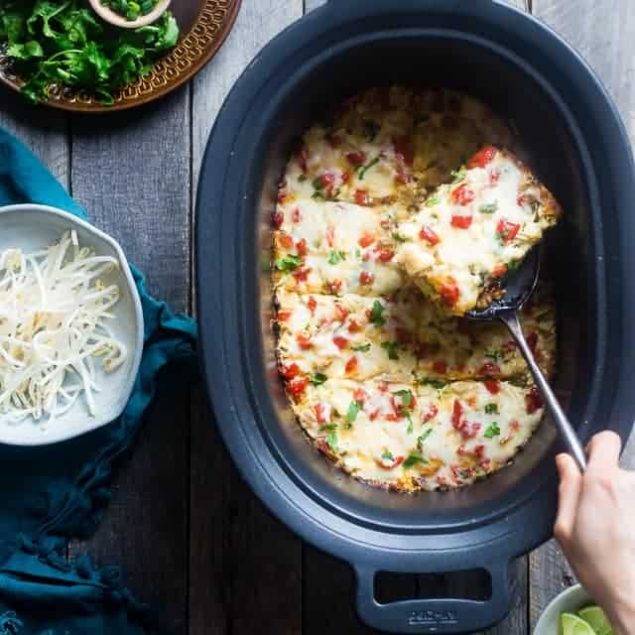 Thai Slow Cooker Zucchini Lasagna - This freezer-friendly zucchini lasagna is made in the slow cooker, and has a Thai peanut twist! It's a healthy, low carb and gluten free weeknight meal that the family will love! | Foodfaithfitness.com | @FoodFaithFit