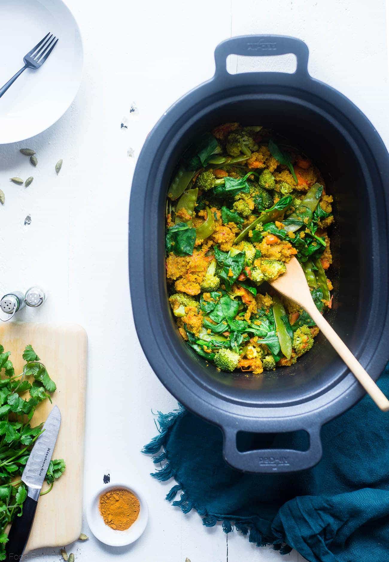 Vegan Turmeric Golden Milk Slow Cooker Quinoa - This healthy slow cooker quinoa with golden milk recipe is an easy, 10 ingredient vegan dinner that is loaded with vegetables! Perfect for busy weeknights!| Foodfaithfitness.com | @FoodFaithFit