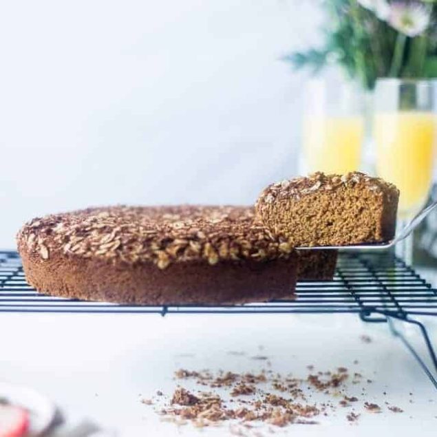 Strawberry Momosa Gluten Free Coffee Cake - This coffee cake tastes like a mimosa and is perfect for Spring brunch or Mother's Day! It's so moist and tender that you'd never know it's healthy and gluten free! | Foodfaithfitness.com | @FoodFaithFit