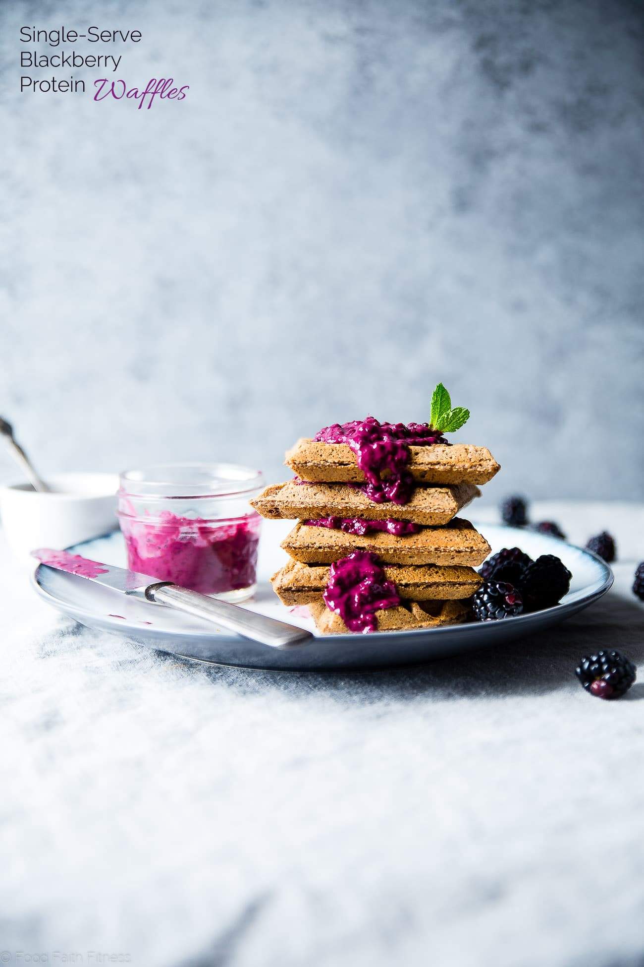 Single Serve Vegan Protein Waffles - These gluten free waffles are ready in only 10 minutes and are packed with healthy, plant-based protein! Top them with blackberry sauce for a delicious breakfast! | Foodfaithfitness.com | @FoodFaithFit