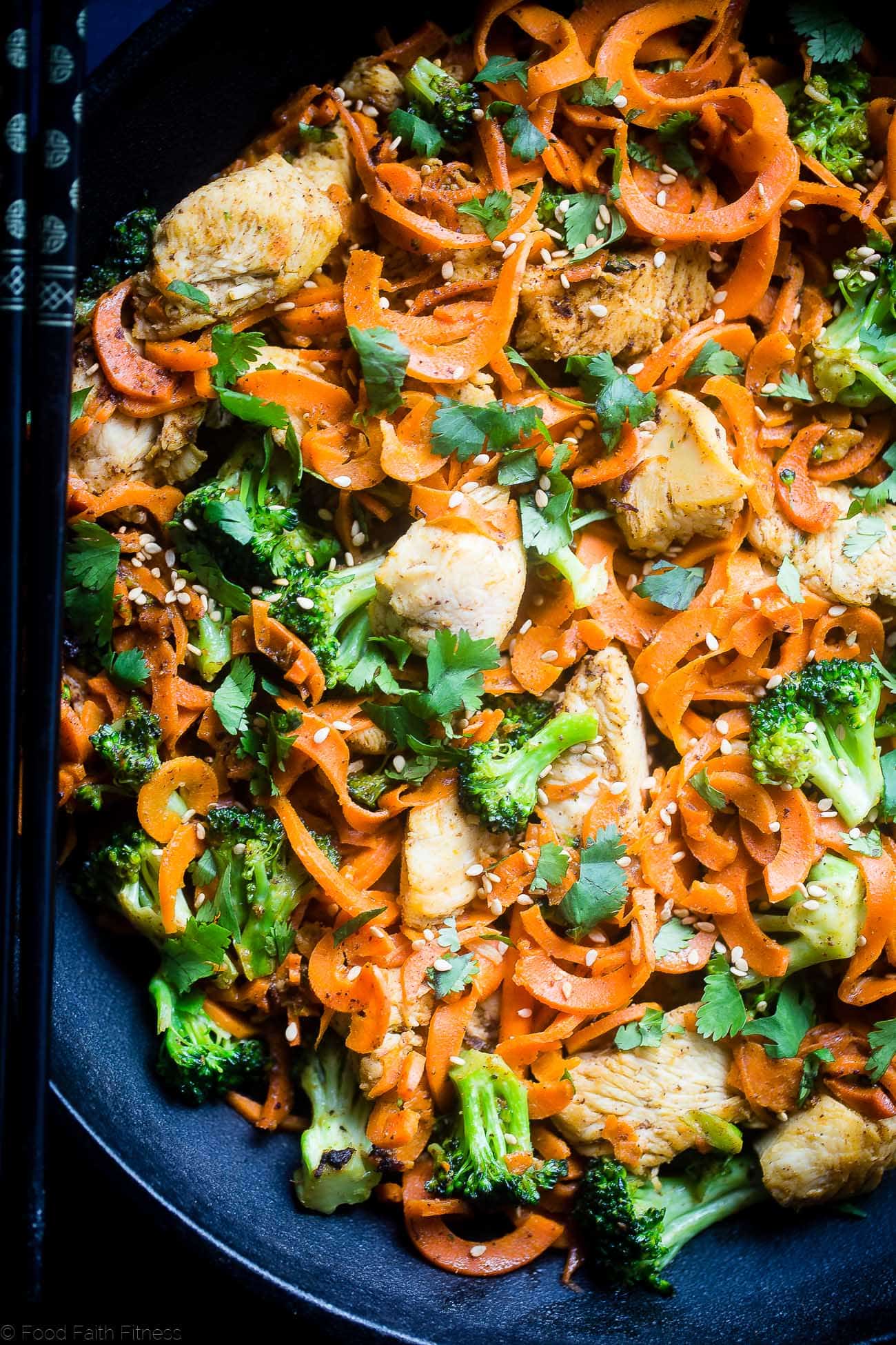 Whole30 Chicken Stir Fry with Cumin Coconut Carrot Noodles - This gluten free, low carb chicken stir fry has creamy coconut, coriander and cardamom! Add broccoli and carrot noodles for a quick and easy, paleo weeknight dinner! | Foodfaithfitness.com | @FoodFaithFit