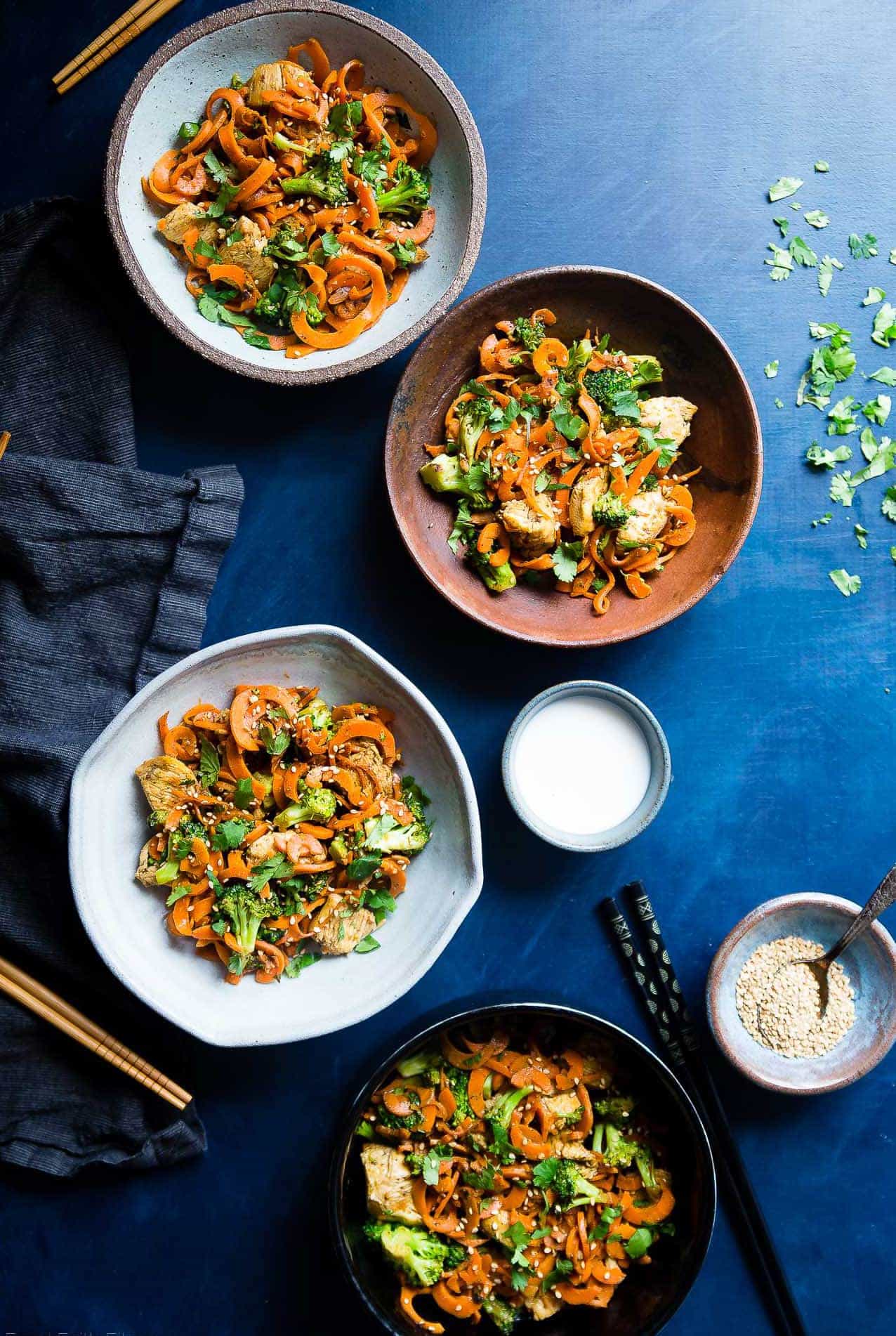 Whole30 Chicken Stir Fry with Cumin Coconut Carrot Noodles - This gluten free, low carb chicken stir fry has creamy coconut, coriander and cardamom! Add broccoli and carrot noodles for a quick and easy, paleo weeknight dinner! | Foodfaithfitness.com | @FoodFaithFit