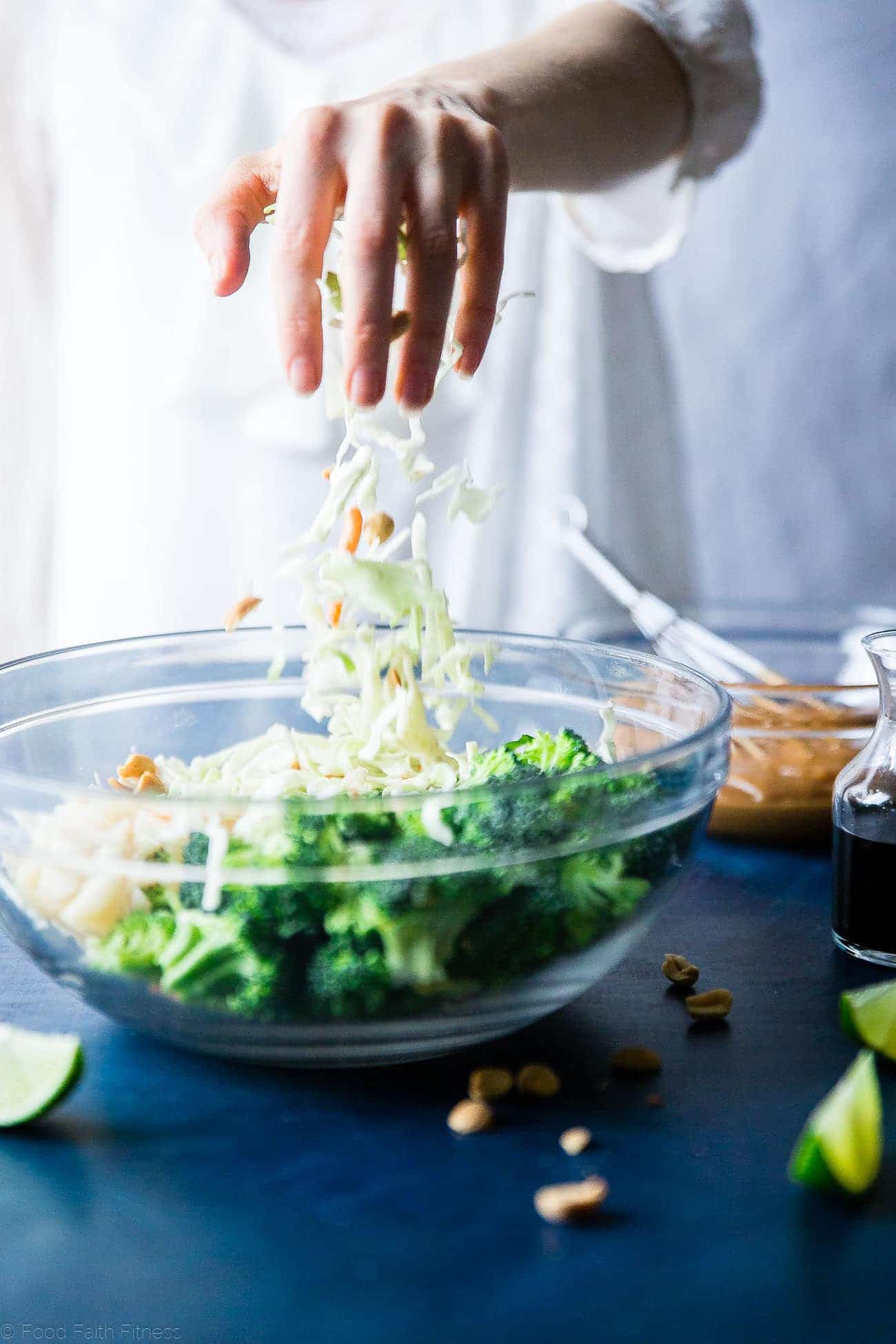Asian Healthy Broccoli Salad - This crowd-pleasing healthy broccoli salad is a no-cook side dish, loaded with creamy peanut sauce! It's quick and easy, gluten free and vegan with a paleo option! | Foodfaithfitness.com | @FoodFaithFit