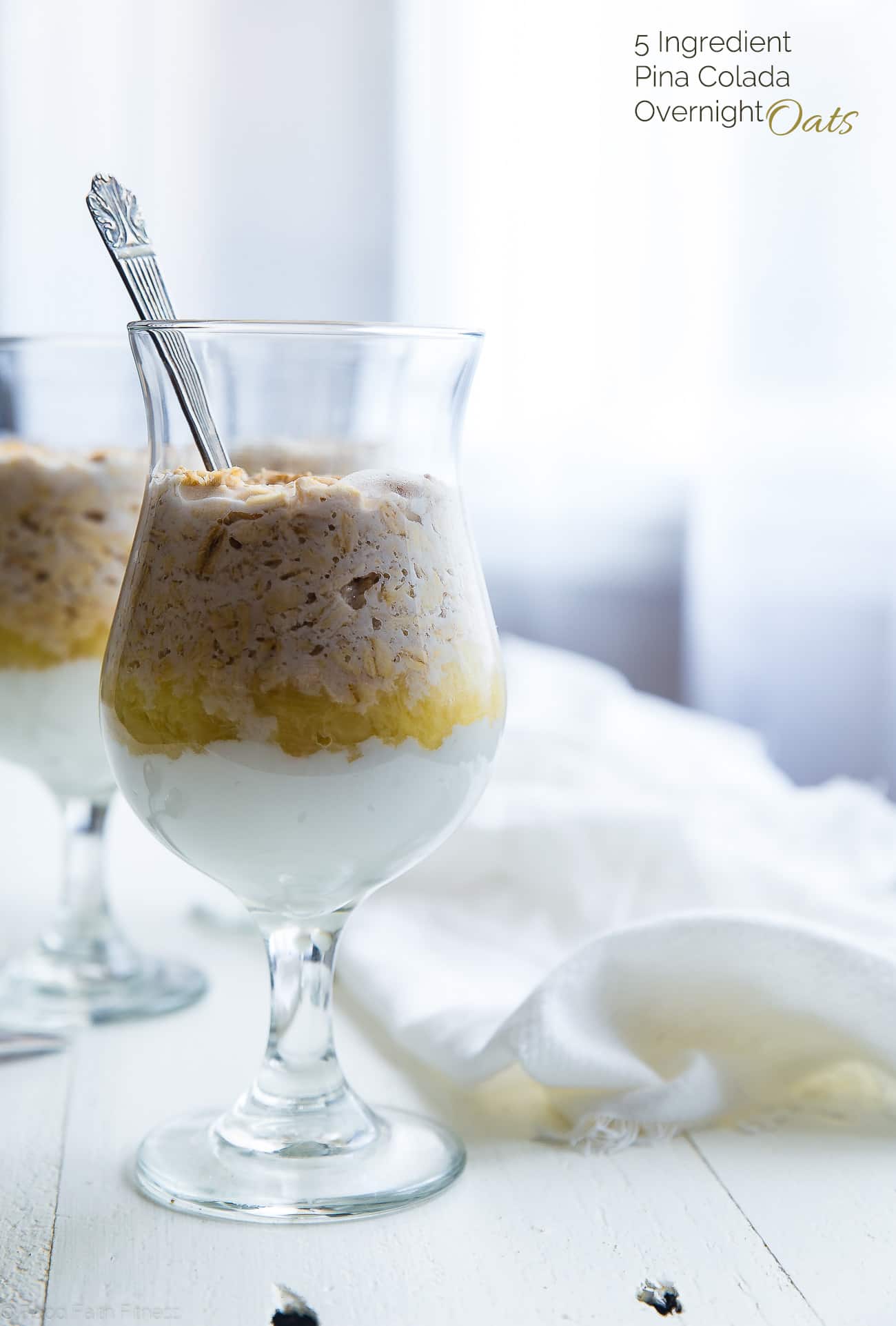 Straight-on shot of Pina Colada Overnight Oats. Recipe on Foodfaithfitness.com