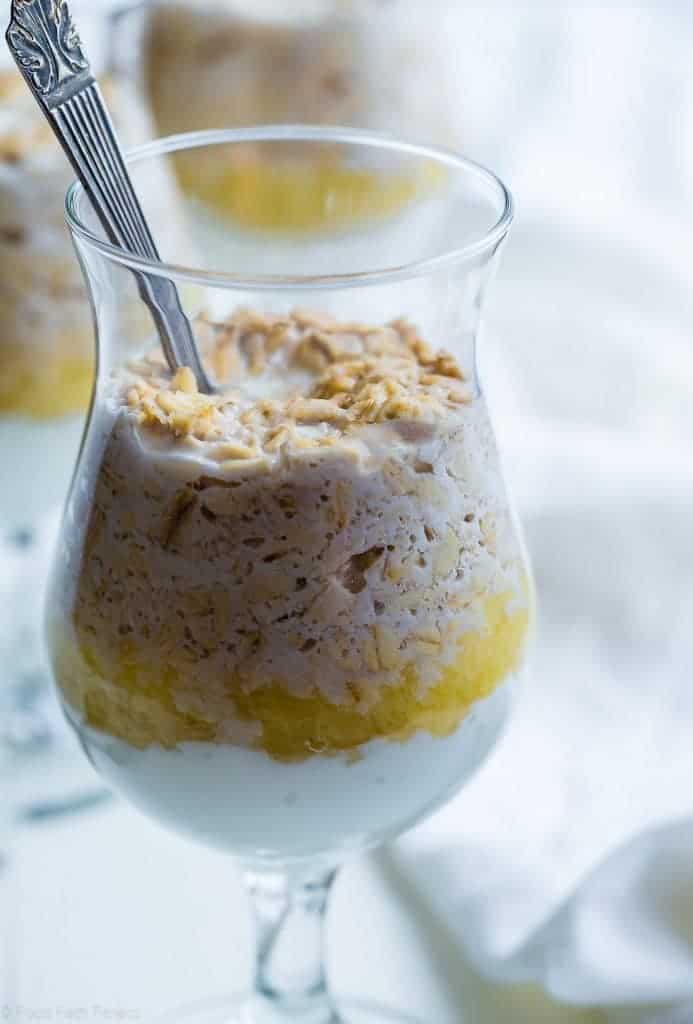 close-up shot of Pina Colada Overnight Oats. Recipe on Foodfaithfitness.com