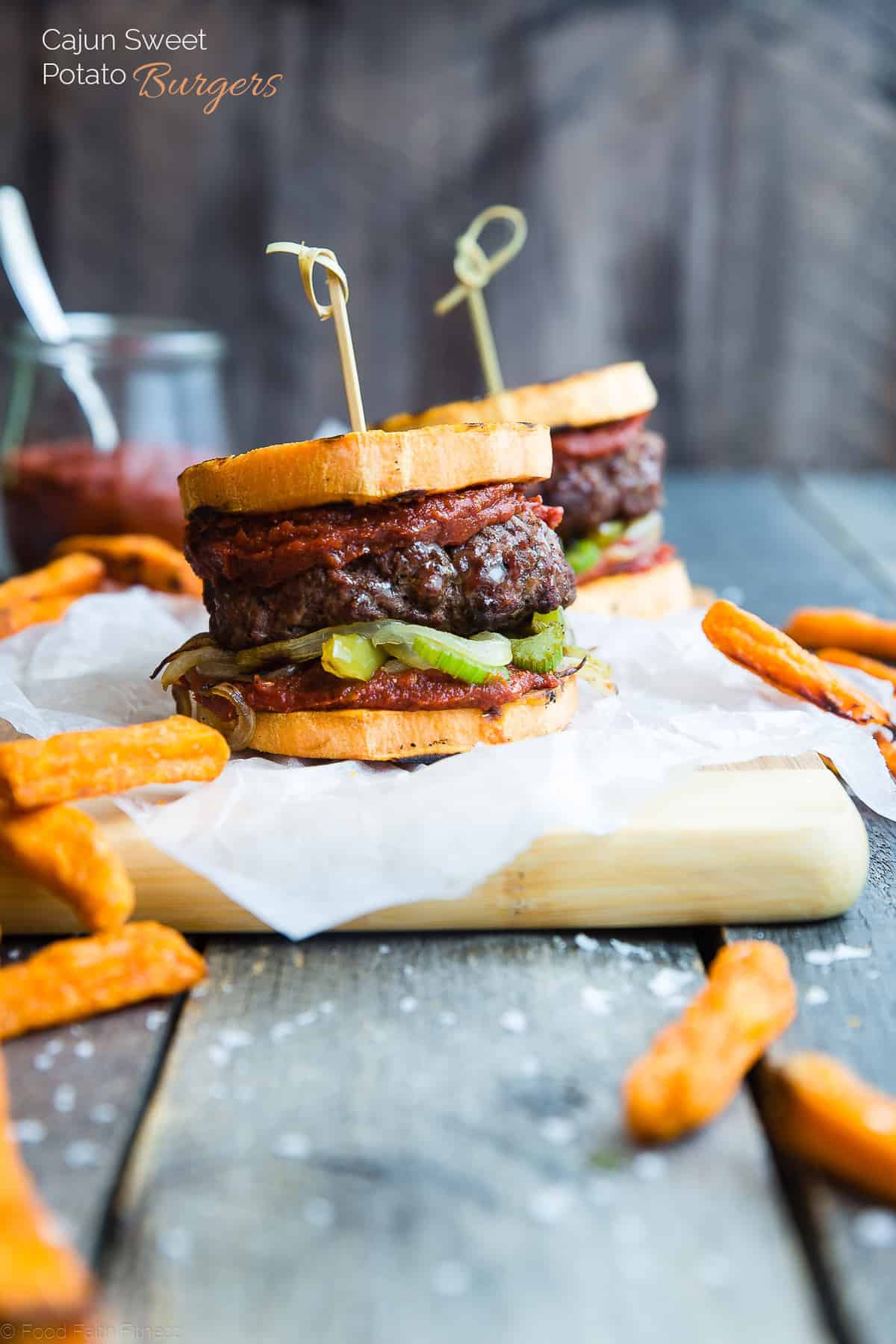 Healthy Cajun Burgers - These crowd-pleasing burgers use grilled sweet potatoes buns instead of bread! They're a healthy, whole30, gluten and dairy free summer meal for only 300 calories! | #Foodfaithfitness | #glutenfree #paleo #whole30 #healthy side view close up of Potato hamburger buns