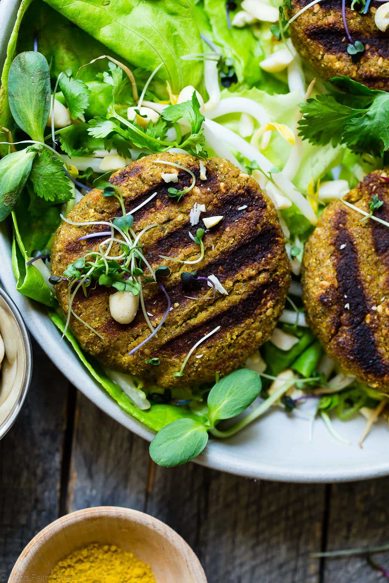 Low Carb Thai Curry Grilled Veggie Burgers - A vegan veggie burger that you can actually grill! They have a Thai peanut twist and curry kick and make a tasty paleo, whole30 and gluten free Summer dinner for under 250 calories! | Foodfaithfitness.com | @FoodFaithFit