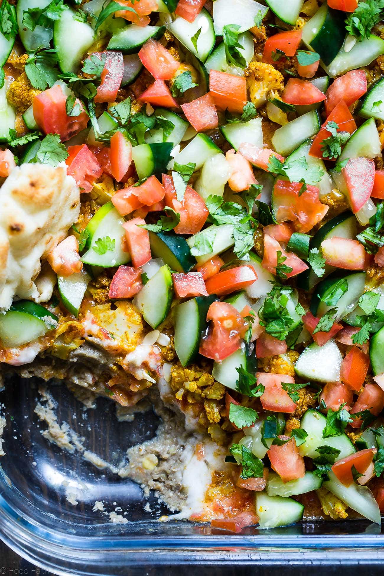Healthy Indian 7 Layer Dip - The classic 7 layer dip recipe gets a healthy, Indian makeover! This dip is loaded with spicy, ethnic flavors and is gluten free and vegan friendly too! It's only 170 calories and perfect for game day! | Foodfaithfitness.com | @FoodFaithFit