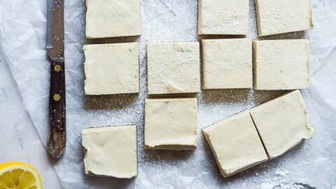 No Bake Paleo Lemon Bars - So creamy you won't believe they're gluten, grain, refined sugar and dairy free! They're only 4 ingredients, so easy to make and so delicious! | Foodfaithfitness.com | @FoodFaithFit