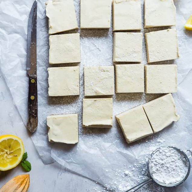 No Bake Paleo Lemon Bars - So creamy you won't believe they're gluten, grain, refined sugar and dairy free! They're only 4 ingredients, so easy to make and so delicious! | Foodfaithfitness.com | @FoodFaithFit