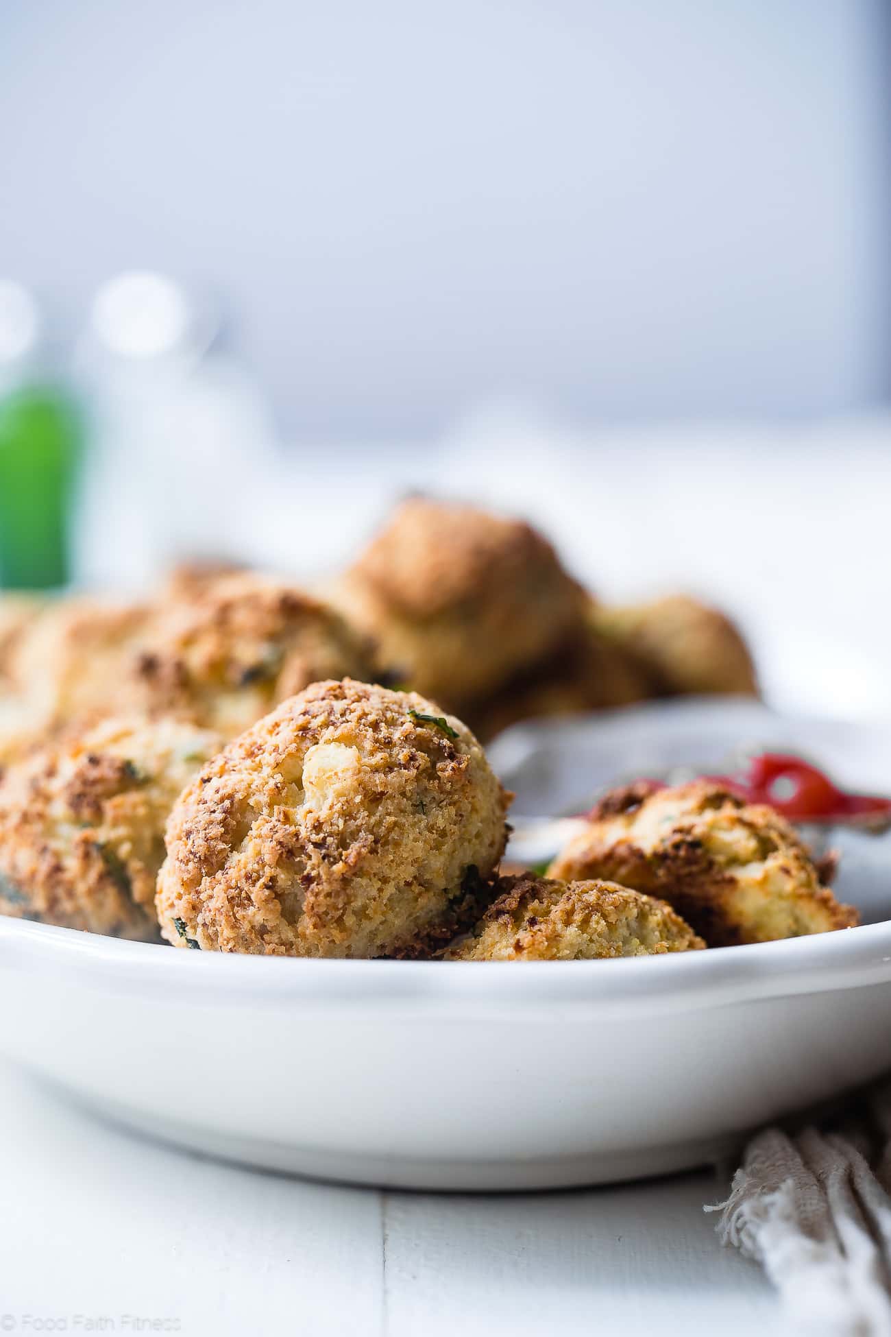 Paleo Cauliflower Tater Tots - So crispy and crunchy you will never believe they're gluten/grain/dairy free, low carb and made from veggies! Even your kids will love them! | Foodfaithfitness.com | @FoodFaithFit