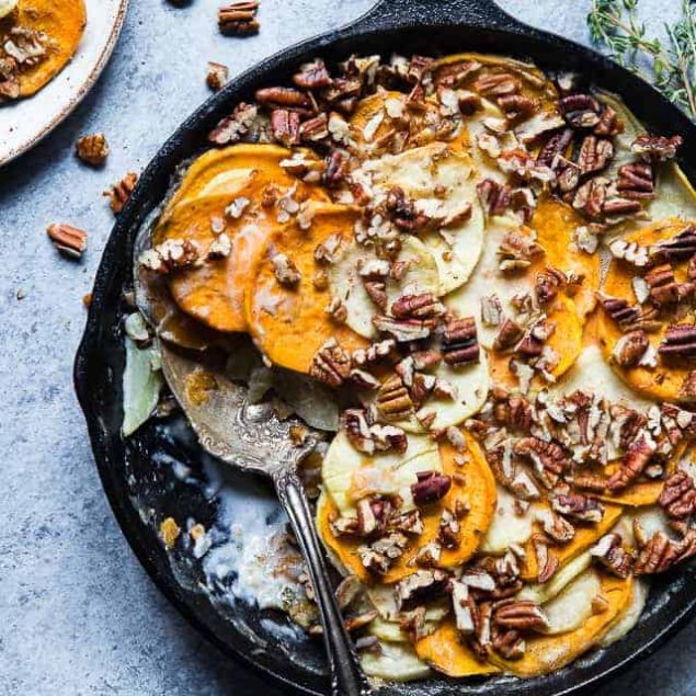 Healthy Scalloped Sweet Potatoes Casserole - So rich and creamy, you will never believe it's gluten free and paleo/vegan/whole30 compliant! Perfect for a healthy Thanksgiving! | Foodfaithfitness.com | @FoodFaithFit