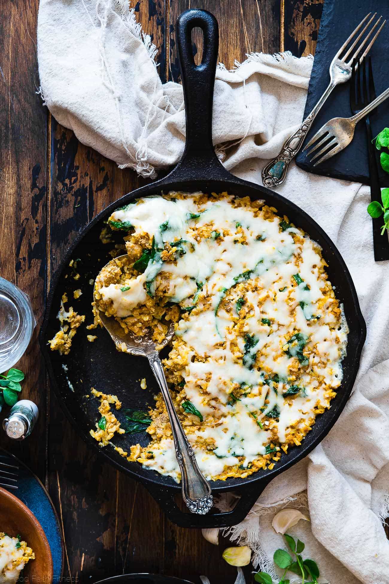 One Pot Pumpkin Rice Casserole - This rice casserole only requires one pot, under 10 ingredients and has lots of cheesy, pumpkin taste! It's an easy, gluten free, healthy fall dinner that is sure to be a crowd pleaser! | Foodfaithfitness.com | @FoodFaithFit