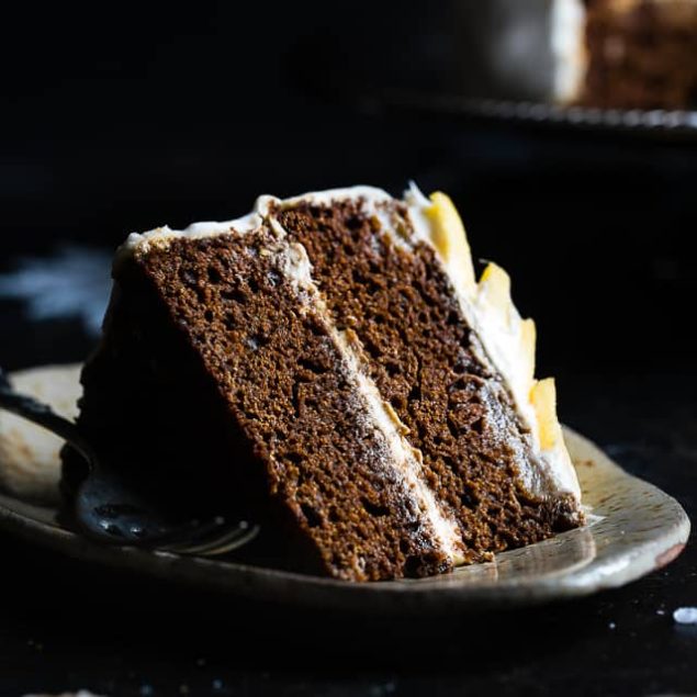 Gluten Free Mango Gingerbread Cake with Coconut Cream - This spicy-sweet, show stopping gluten free gingerbread cake is studded with juicy, fresh mangoes to create a healthy, paleo-friendly, festive dessert for the Holidays! | Foodfaithfitness.com | @FoodFaithFit