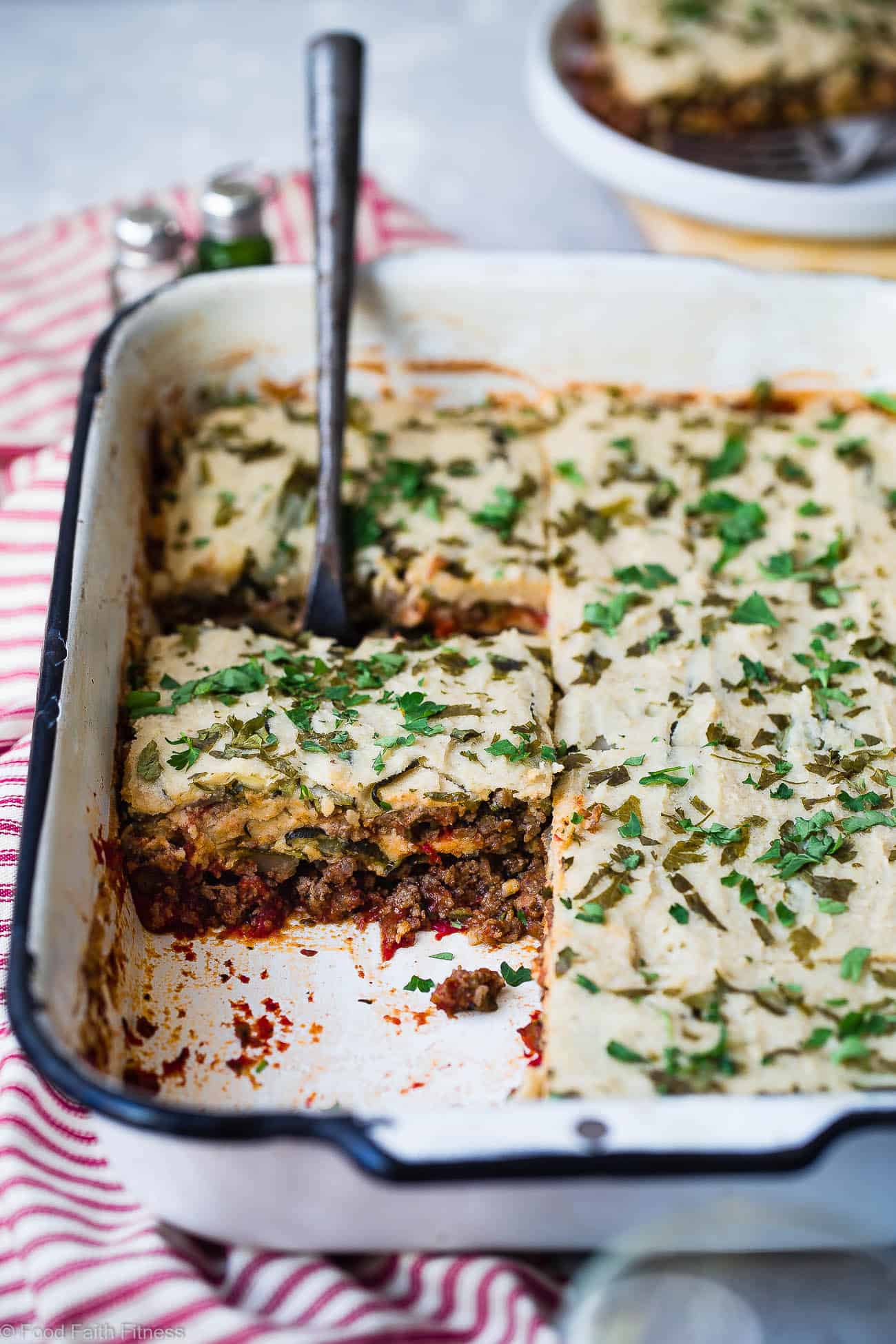 Low Carb Paleo Zucchini Lasagna - You will never know this family-pleasing lasagna is gluten/grain/dairy free, low carb and whole30 compliant! Not even the pickiest eaters will miss the cheese and pasta! | #Foodfaithfitness | #Paleo #whole30 #lowcarb #lasagna #glutenfree
