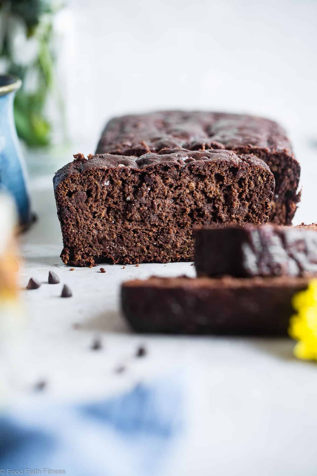 Easy Chocolate Paleo Zucchini Bread - This gluten free, almond flour Chocolate Paleo Zucchini Bread is secretly packed with protein! It's a healthy breakfast or snack that freezes great! | #Foodfaithfitness | #FoodFaithFit | #Paleo #Glutenfree #Collagen #Chocolate #Healthy front view of paleo zucchini bread with chocolate chips