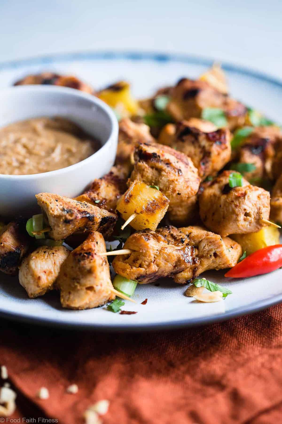 Pineapple Thai Grilled Chicken Skewers with Peanut Sauce - Addictingly spicy, with just a bit of smoky and sweet! The perfect healthy, gluten free dinner for summer with a paleo option! | #Foodfaithfitness | #Glutenfree #Paleo #Healthy #Dairyfree #Chicken
