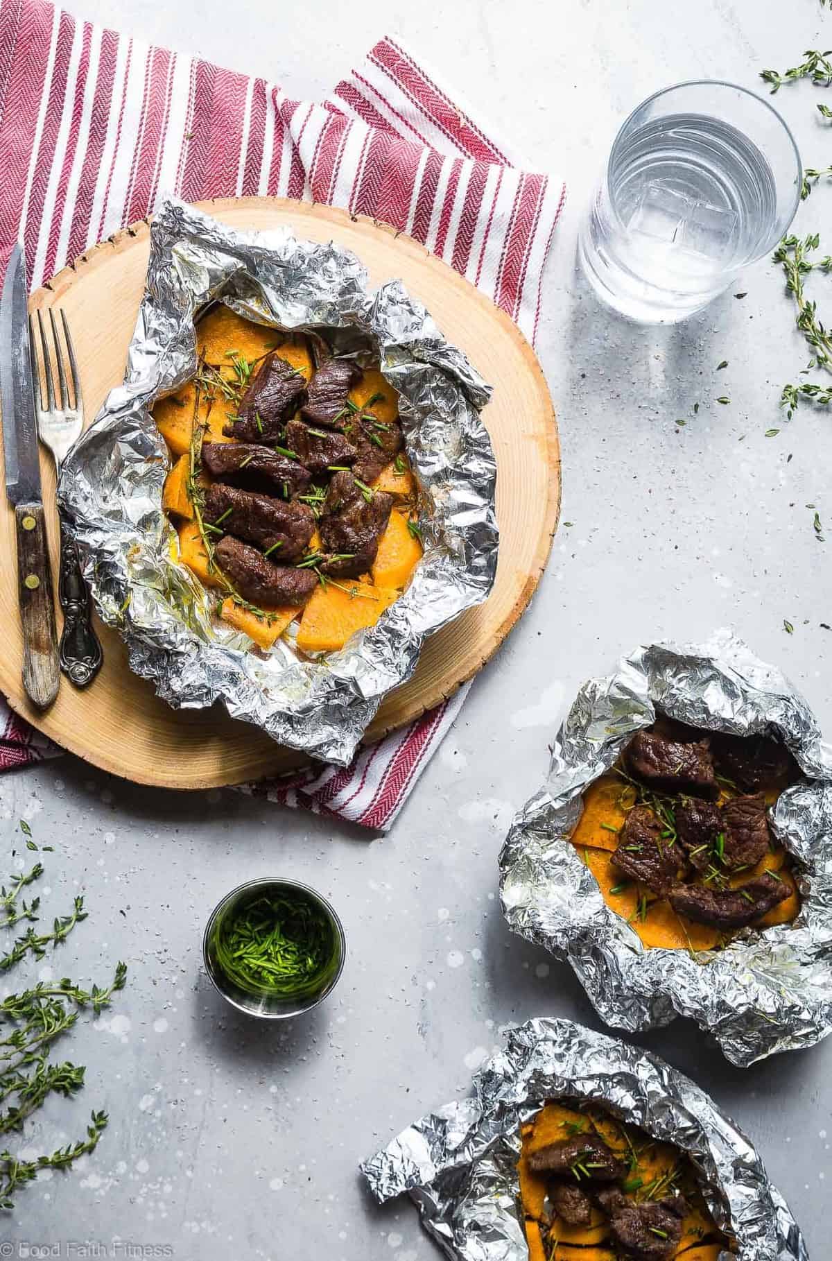 Garlic Steak and Potato Foil Packets - These EASY Steak Foil Packets are an easy, healthy and whole30 approved summer dinner with only 6 ingredients and 300 calories! Sure to please even the pickiest of eaters! | #Foodfaithfitness | #Glutenfree #Paleo #Whole30 #Grilling #Dairyfree