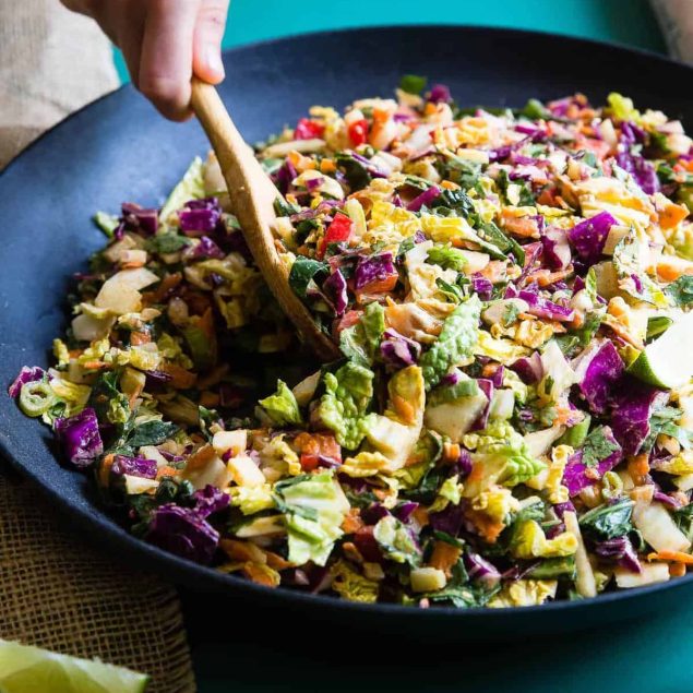 Oriental Coleslaw being served from a wok