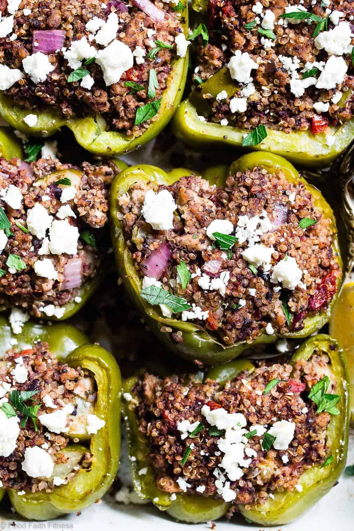 Greek Healthy Turkey Quinoa Stuffed Bell Peppers - These Turkey Quinoa Stuffed Bell Peppers are an easy, crowd-pleasing, weeknight dinner packed with Greek flavors! Healthy, gluten free, dairy free and SO delicious! | #Foodfaithfitness | #Glutenfree #Healthy #Quinoa #Dairyfree #Dinner