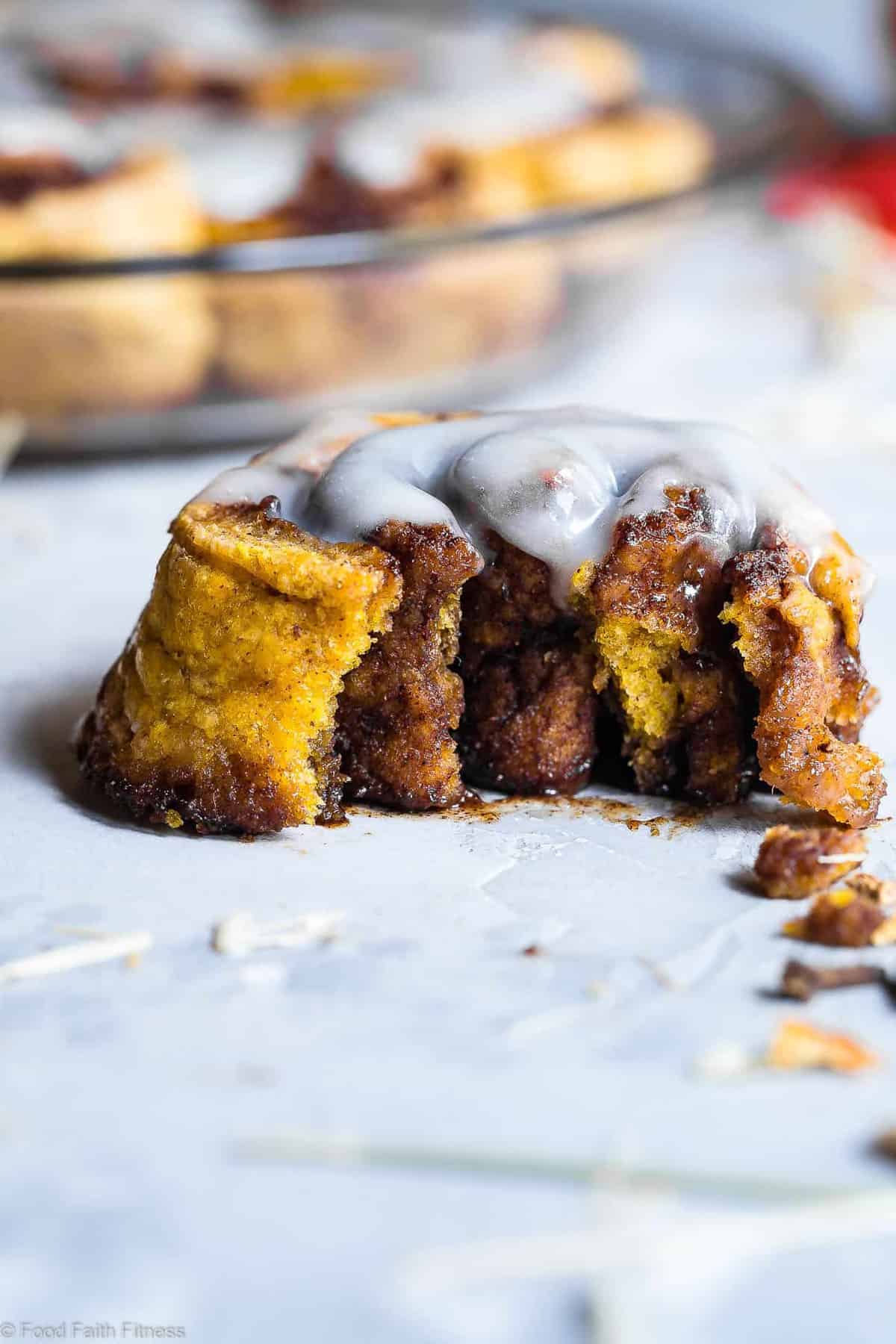 Gluten Free Vegan Pumpkin Cinnamon Rolls - These easy Pumpkin Spice Cinnamon Rolls are so soft and fluffy you won't believe they're gluten, dairy and egg free! Loaded with spicy-sweet fall flavor and SO delicious! | #Foodfaithfitness | #Glutenfree #vegan #dairyfree #eggfree #pumpkin