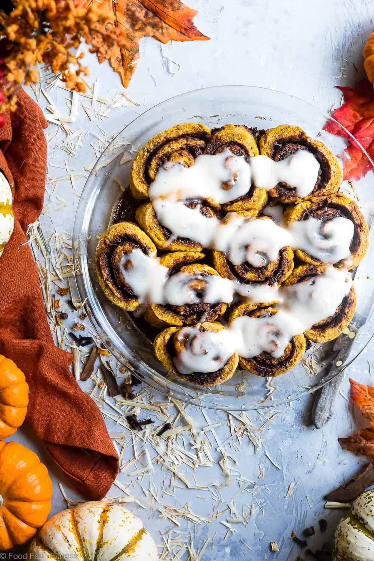 Gluten Free Vegan Pumpkin Cinnamon Rolls - These easy Pumpkin Spice Cinnamon Rolls are so soft and fluffy you won't believe they're gluten, dairy and egg free! Loaded with spicy-sweet fall flavor and SO delicious! | #Foodfaithfitness | #Glutenfree #vegan #dairyfree #eggfree #pumpkin